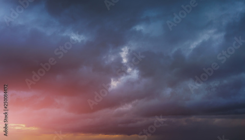 Fototapeta Naklejka Na Ścianę i Meble -  background of cloudy dark sky at sunset