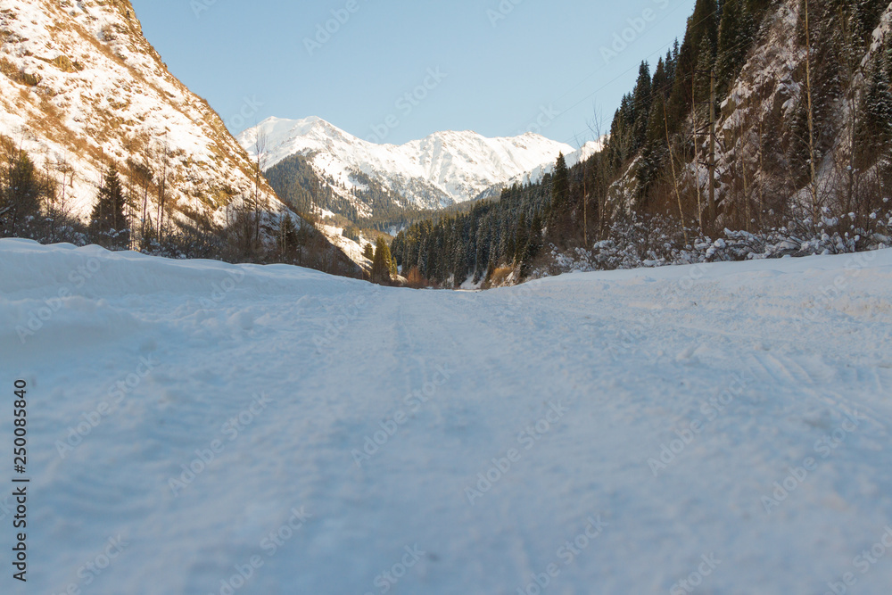 snowy road in the mountains of Ili Alatau