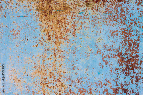 Old rusty metal background with cracked paint