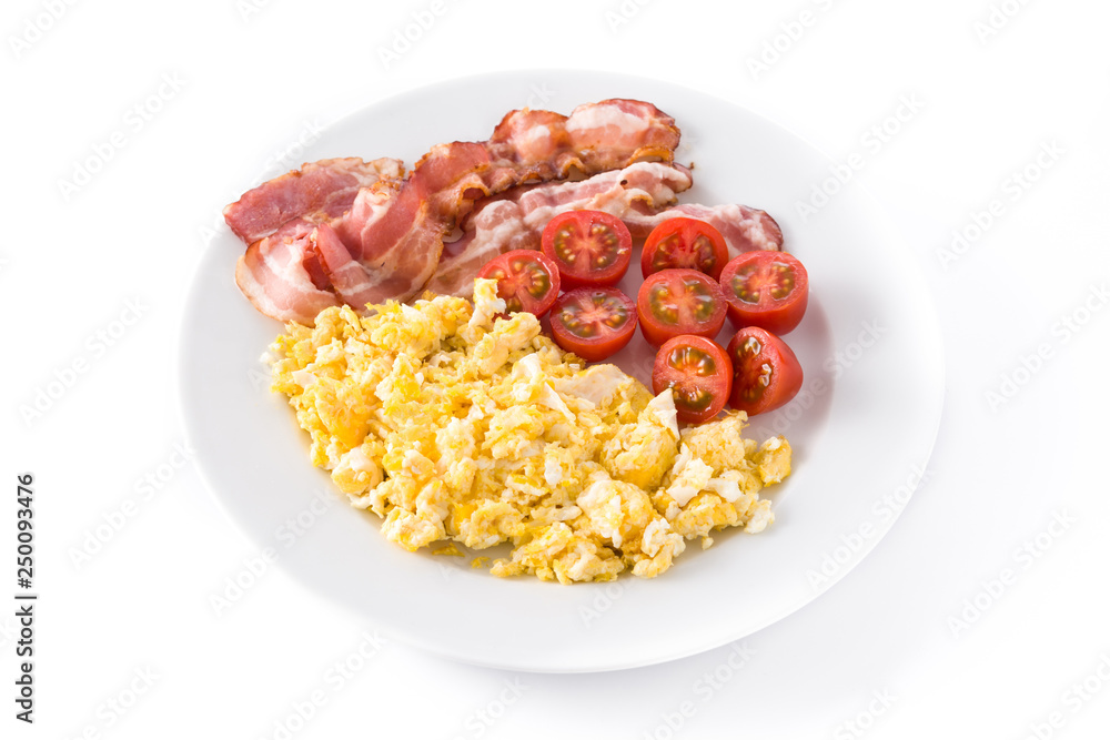Breakfast with scrambled eggs, bacon and tomatoes isolated on white background Breakfast with scrambled eggs, bacon and tomatoes isolated on white background