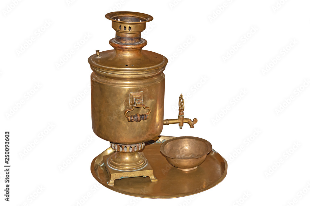Old copper samovar on tray isolated on white background Old copper samovar on tray isolated on white background