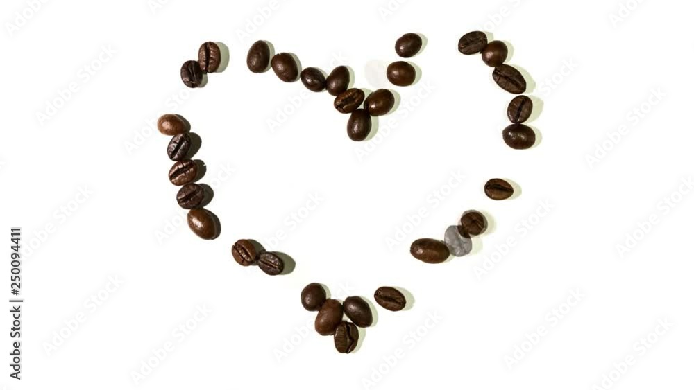 Stop Motion of a heart built with coffee beans. Stop Motion of a heart built with coffee beans.