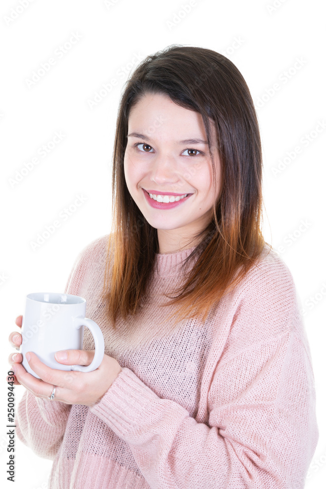 Portrait of a young adorable brunette woman enjoying her warm cozy drink in big blank white mug Portrait of a young adorable brunette woman enjoying her warm cozy drink in big blank white mug