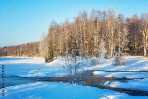 Winter landscape with rivers on a sunny day