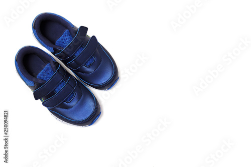 Pair of sports shoes, blue sneakers isolated on white background. Top view.