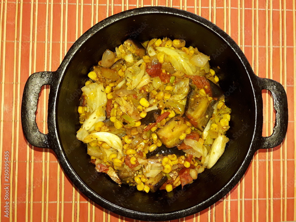 Mixed veggies cooked in a iron pot Mixed veggies cooked in a iron pot