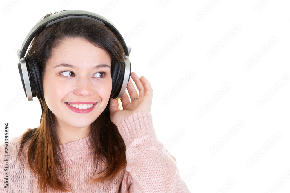 portrait of a young smiling woman with headphones music look side blank copy space portrait of a young smiling woman with headphones music look side blank copy space