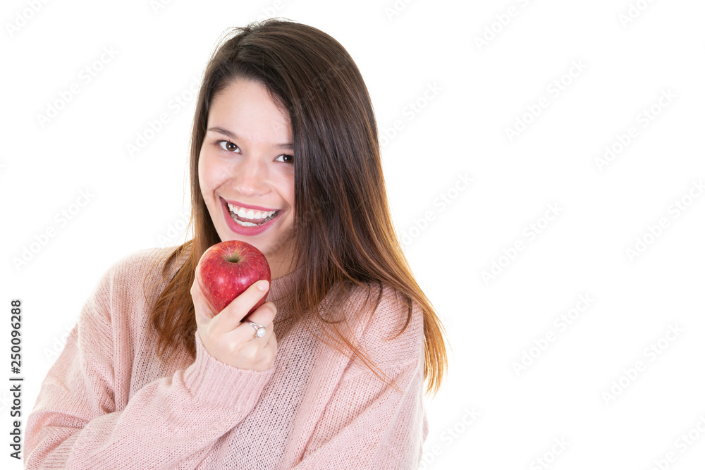 young beautiful woman on white background with red apple smiling and laughs young beautiful woman on white background with red apple smiling and laughs