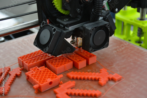 3D Printer in Action Printing a Toy