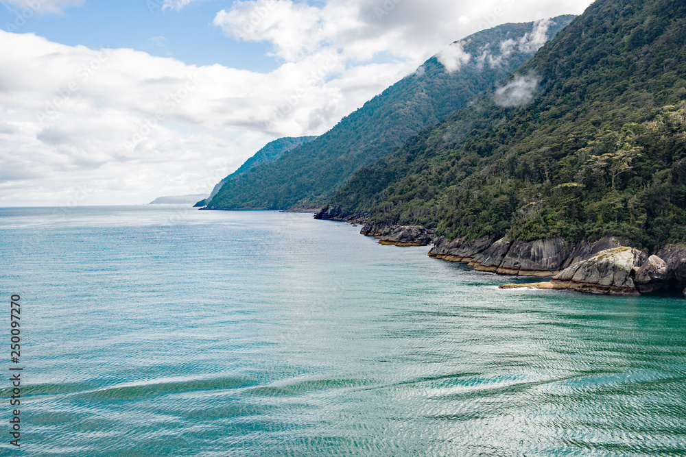 Obraz premium Entry into the Tasman Sea from Milford Sound, Fiordland National Park, South Island, New Zealand
