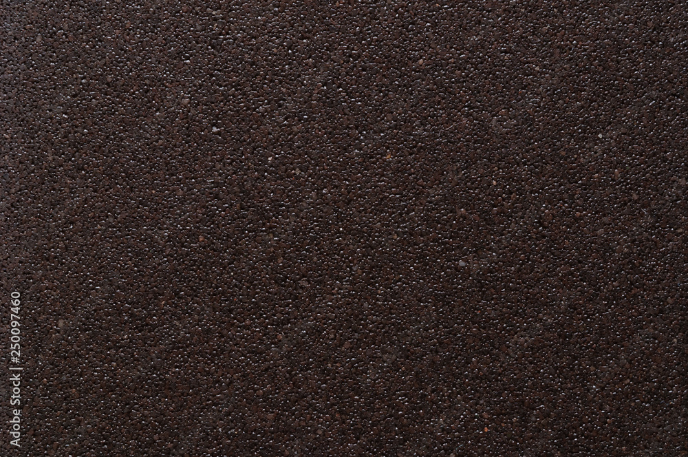 Fototapeta premium Texture of chocolate brown ceramic surface, macro.