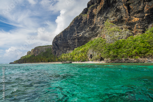 Tropical beach between the rocks. Paradise secluded island.  © Irina