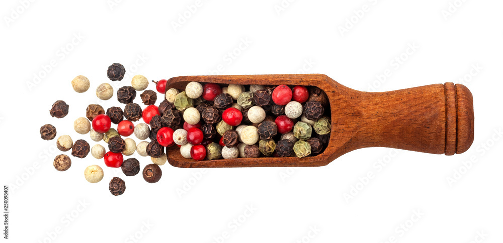 Pepper mix. Black, red, white and allspice peppercorns in scoop isolated on white background, top view Pepper mix. Black, red, white and allspice peppercorns in scoop isolated on white background, top view