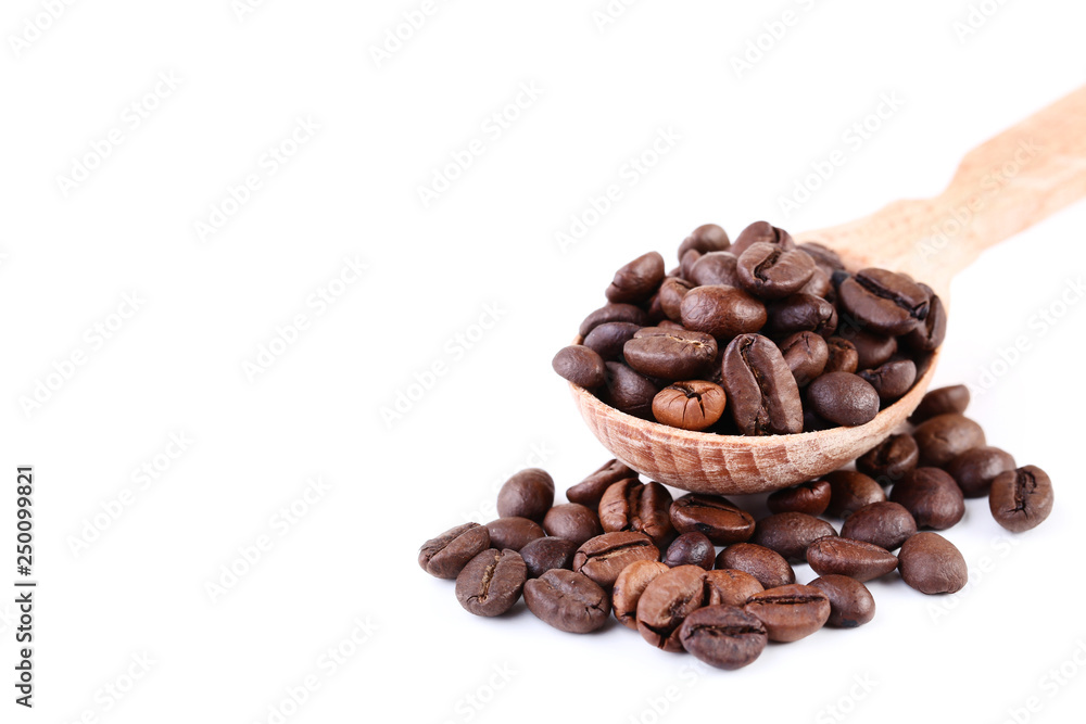 Coffee beans in wooden spoon isolated on white background Coffee beans in wooden spoon isolated on white background