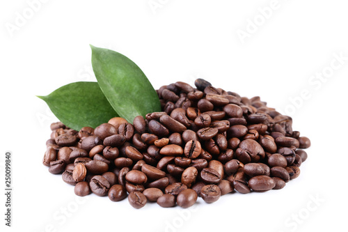Coffee beans wtih green leafs isolated on white background