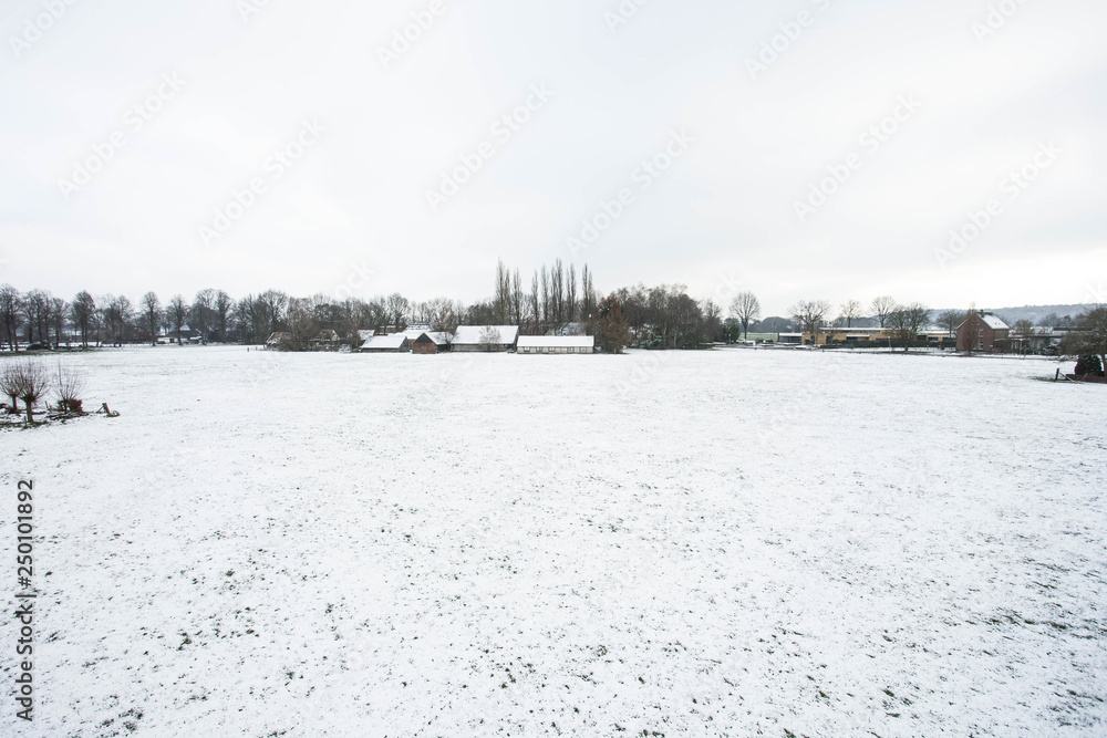 Snow landscape with farm field, meadow, white nature