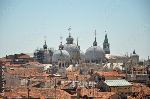 Domes of basilica San Marco in Venice. Panorama view of the roofs of Venice