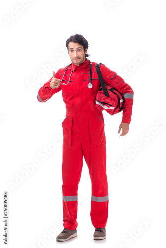 Young paramedic in red uniform isolated on white 