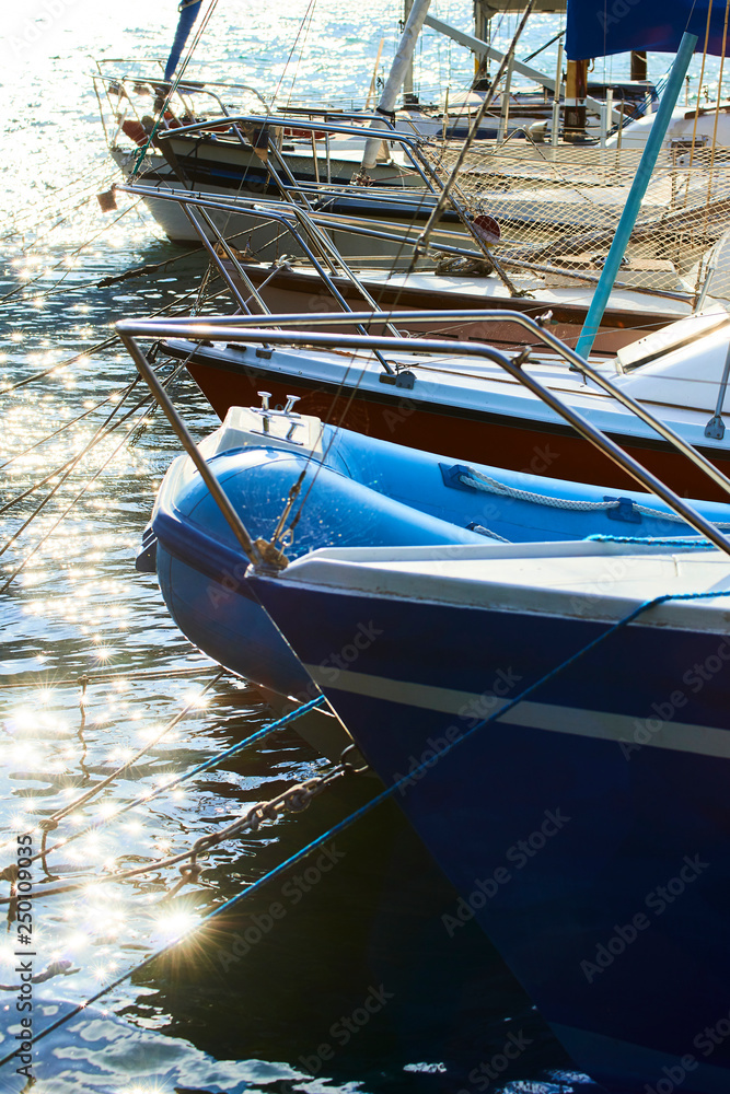 Sailboat harbor, Close up of many beautiful moored sail yachts and boats in the sea port, modern water transport, summertime vacation