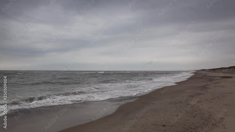 On the beach in Skagen after heavy rain, Denmark. Place where the Baltic meets the North Sea. On the beach in Skagen after heavy rain, Denmark. Place where the Baltic meets the North Sea.