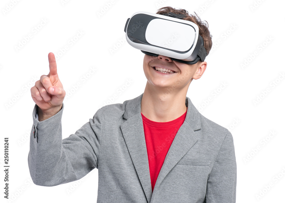 Happy Teen Boy wearing Virtual Reality Goggles watching movies or playing  video games, isolated on white. Cheerful Teenager looking in VR glasses.  Funny Child experiencing 3D gadget technology. Stock Photo | Adobe