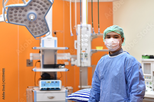 Equipment and medical devices in hybrid operating room.scrub nurse preparing medical instruments for operation.