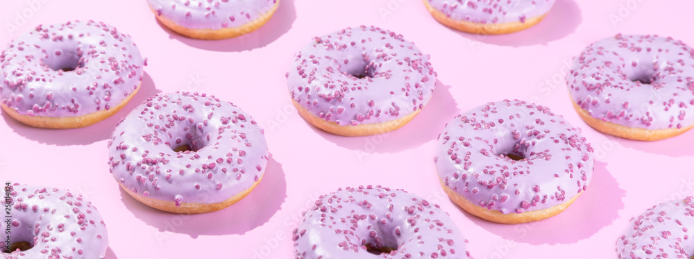 Pimk donuts on pink background, pattern, hard light Pimk donuts on pink background, pattern, hard light