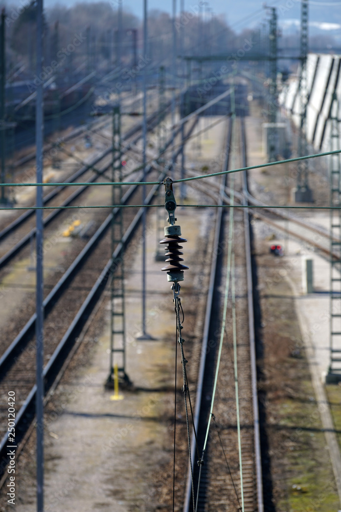 Railroad and railroad tracks photographed from a bridge in Regensburg in good light 