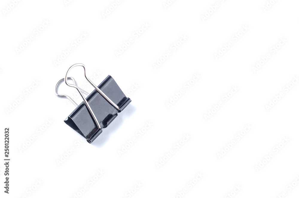 Black stationery clip on a white background, isolate Black stationery clip on a white background, isolate
