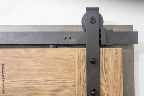 Vintage sliding door with open ferrous metal fittings