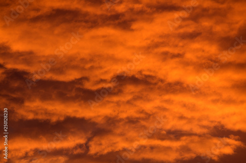  orange dark clouds at sunset