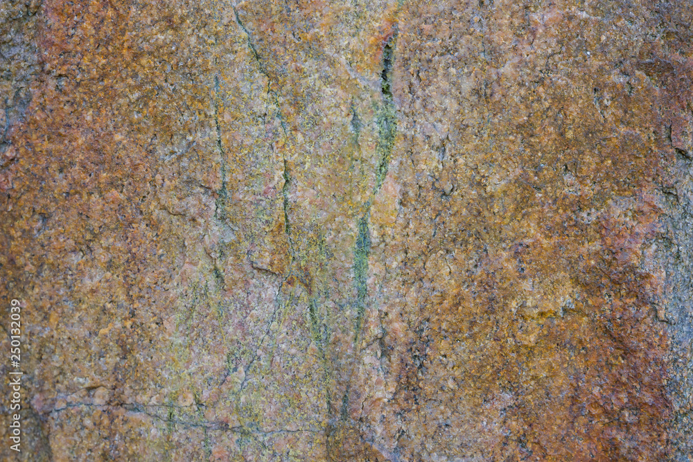 Granite texture close up. Granite rocks with porous surface. Background from solid stone. Pattern with natural material Granite texture close up. Granite rocks with porous surface. Background from solid stone. Pattern with natural material