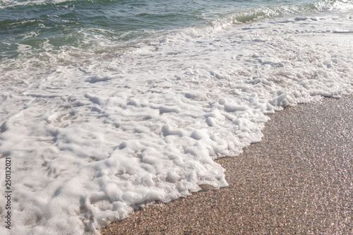 Seashore and the beach and the sea on a sunny spring day.