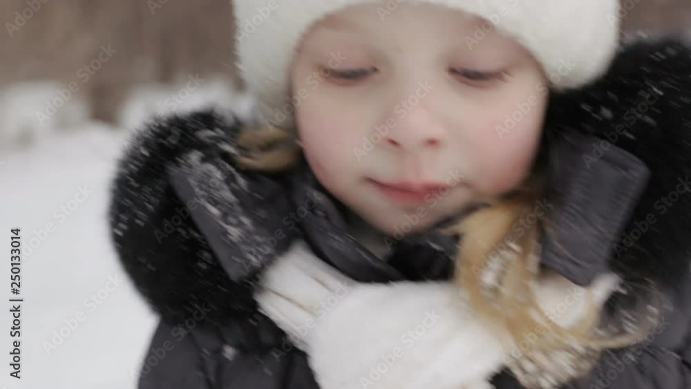 portrait of a beautiful little girl in the winter forest portrait of a beautiful little girl in the winter forest