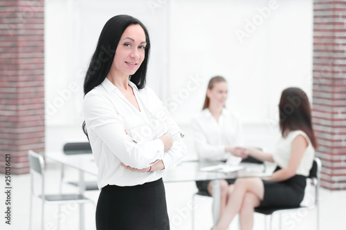 portrait of confident business woman on blurred office background