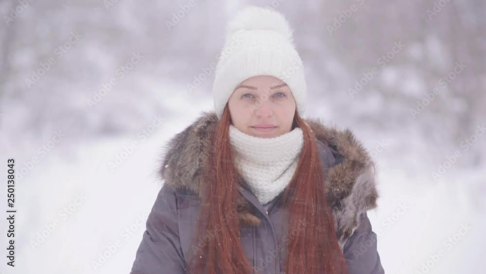 portrait of a beautiful woman in the winter forest portrait of a beautiful woman in the winter forest