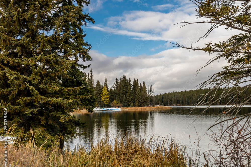 Fototapeta premium Loch Leven in her fall colours, Cyprus Hills Interprovincial Provincial Park, Saskatchewan, Canada