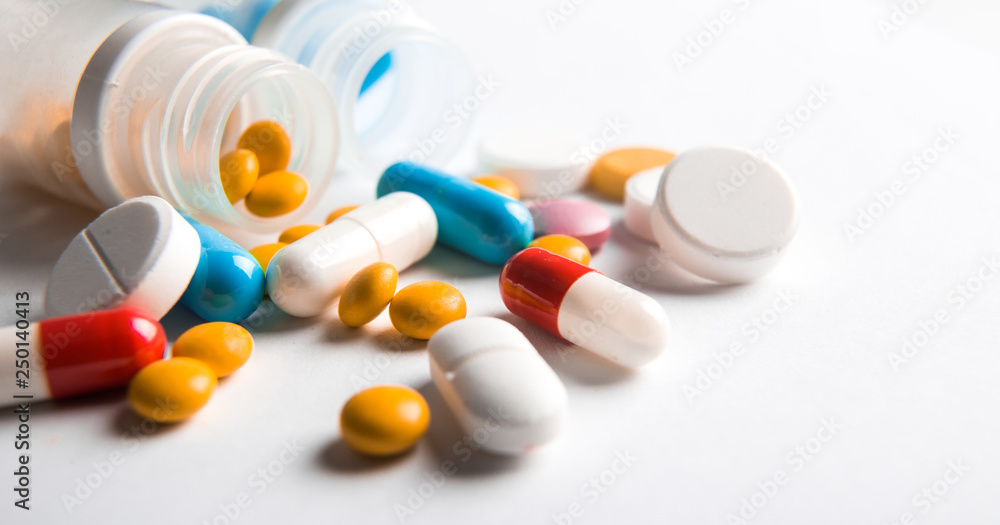 Assorted pharmaceutical medicine pills, tablets and capsules.Pills background.