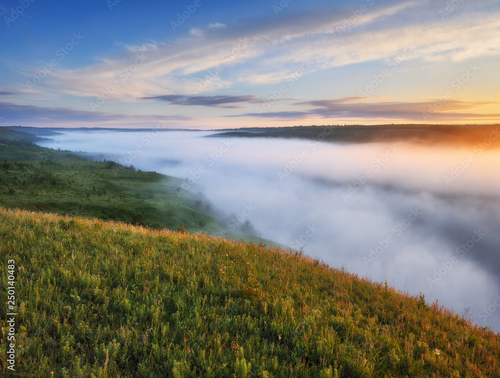 Spring fog over the river canyon. scenic dawn