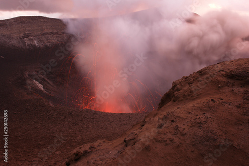 Active volcano Mount Yasur erupts on Tanna Island, Vanuatu, shooting lava into the air