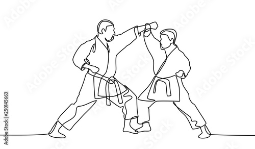 continuous line drawing of two male karate athlete - Vector