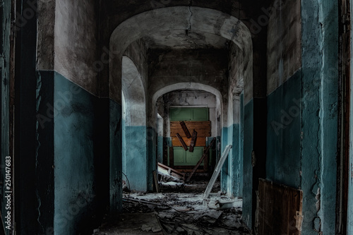 Fototapeta Dark and creepy corridor of old abandoned hospital