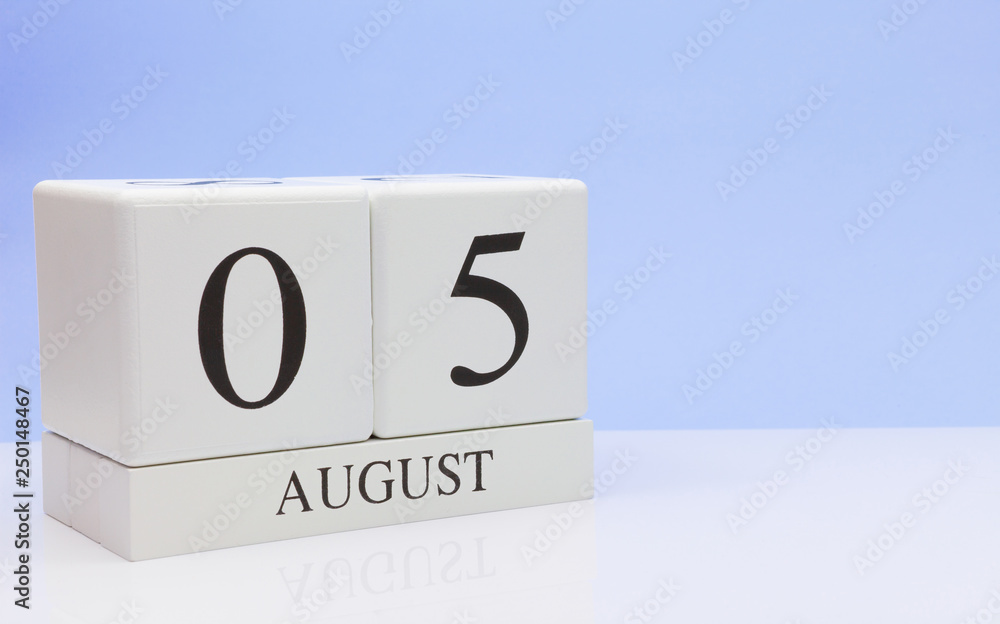 August 05st. Day 5 of month, daily calendar on white table with reflection, with light blue background. Summer time, empty space for text August 05st. Day 5 of month, daily calendar on white table with reflection, with light blue background. Summer time, empty space for text