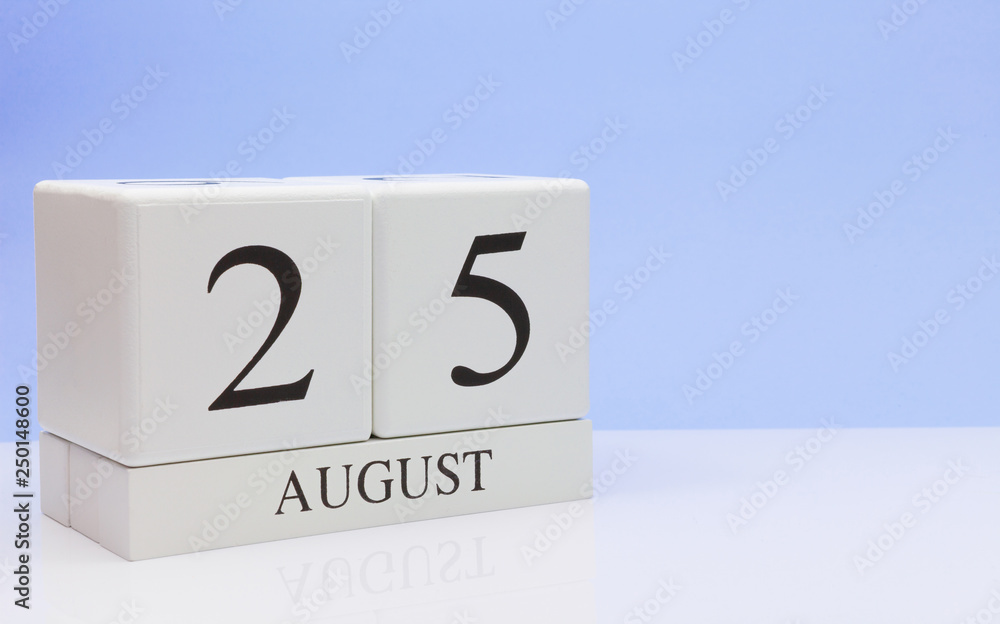 August 25st. Day 25 of month, daily calendar on white table with reflection, with light blue background. Summer time, empty space for text August 25st. Day 25 of month, daily calendar on white table with reflection, with light blue background. Summer time, empty space for text
