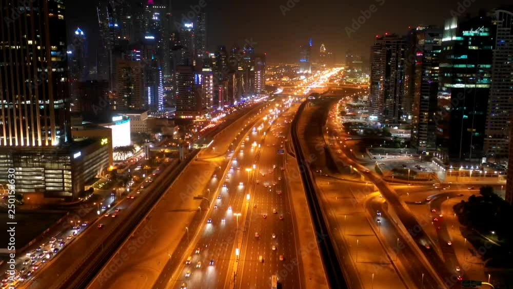 Aerial hyperlapse of a busy highway in Dubai at night, U.A.E. Aerial hyperlapse of a busy highway in Dubai at night, U.A.E.
