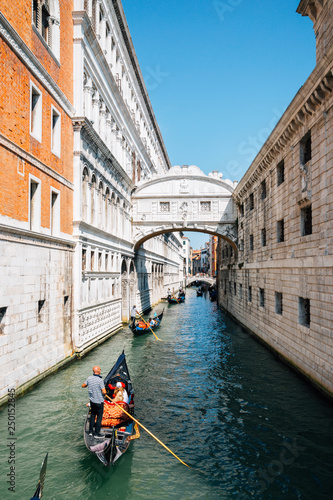 Bridge of Sighs and gondola on canal in Venice, Italy