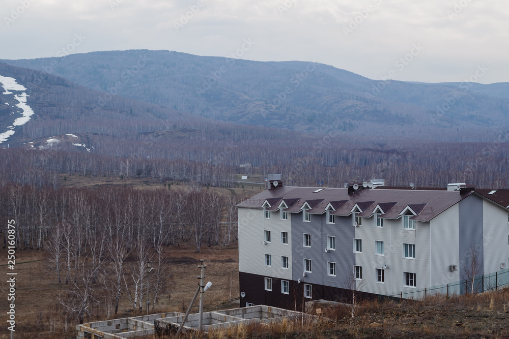 Fototapeta premium a multi-storey house in the mountains