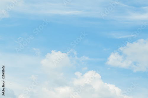 Soft clouds. Beautiful sky background. Blue sky with white clouds. Clear day and good weather.