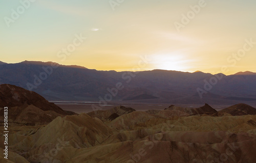 Landscape of Death Valley National Park at Zabriskie Point at Sunset. Erosional landscape in California  USA. Beautiful View of Death Valley National Park.