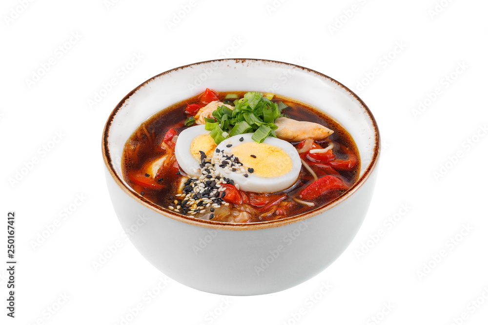 Traditional Italian minestrone soup with meat, celery, tomatoes, bell pepper and pasta in a bowl isolated on white background. Traditional Italian minestrone soup with meat, celery, tomatoes, bell pepper and pasta in a bowl isolated on white background.